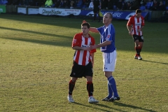 Charlie-Macdonald-shakes-hands-with-Shreck-while-Sam-wood-does-quickstep